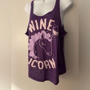 Wine purple tank top fits like a medium 
Wineicorn wino unicorn